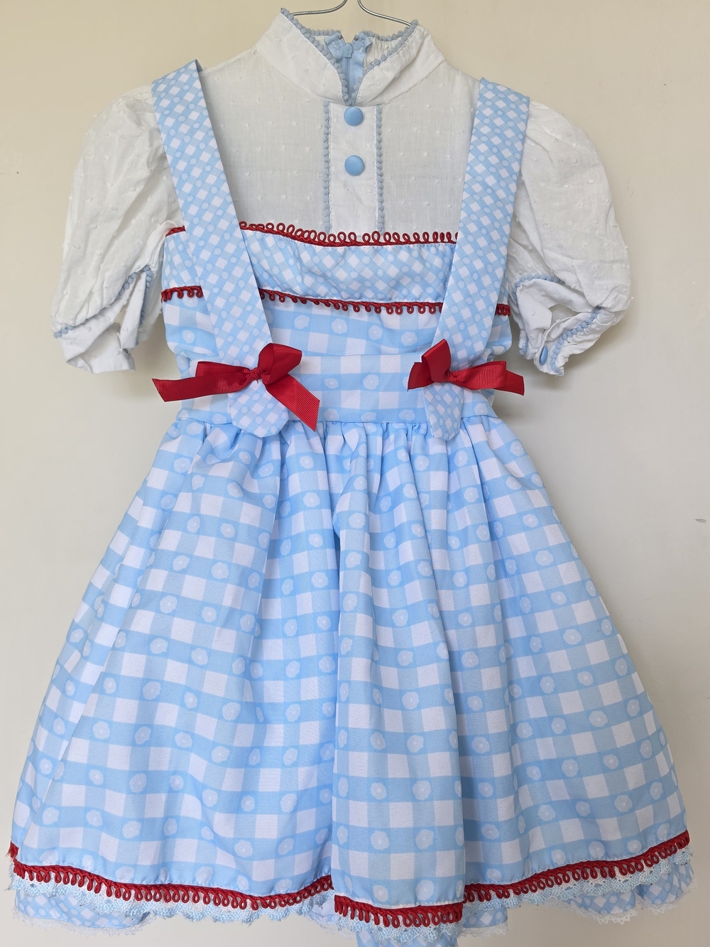 Children's Light Blue Gingham Costume Dress with Red Bow Accents